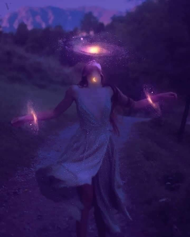 An astral figure standing on a path at dusk beneath a violet galaxy